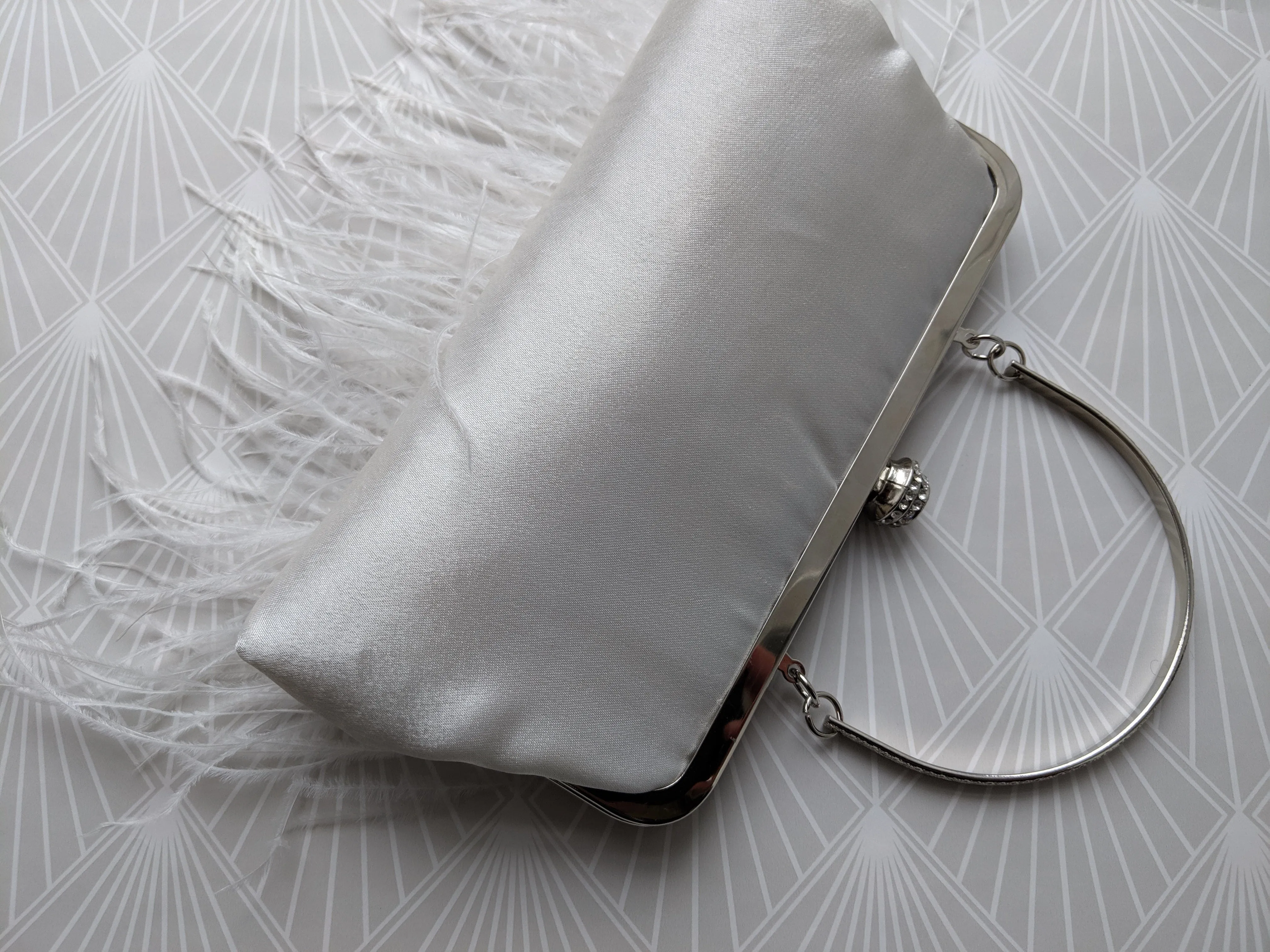 Feather bag with diamante clasp